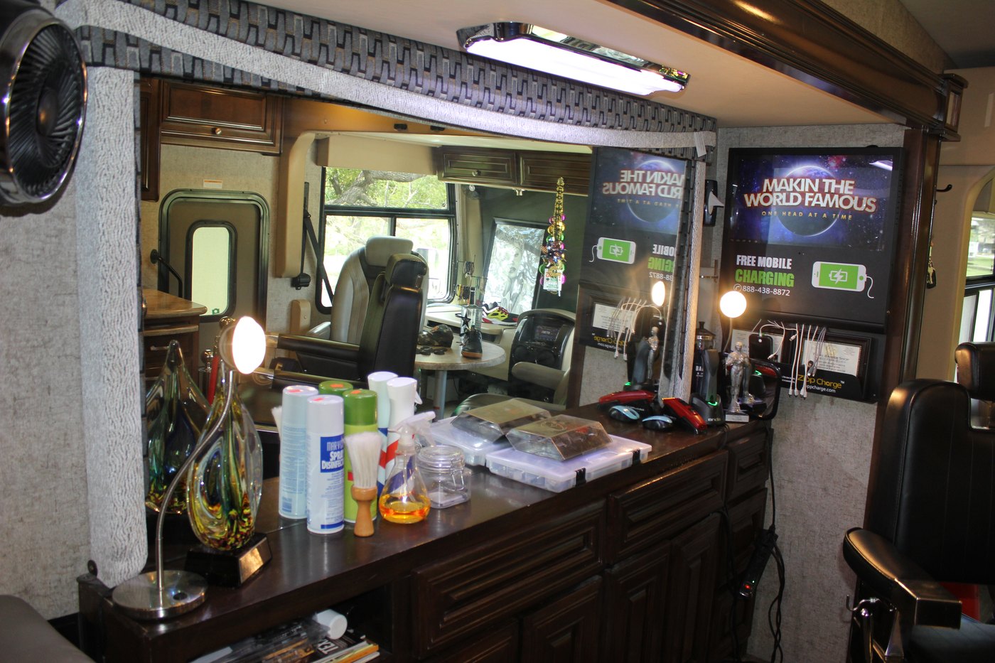 The mobile barbershop interior fit-out, chairs, mirrors and screens